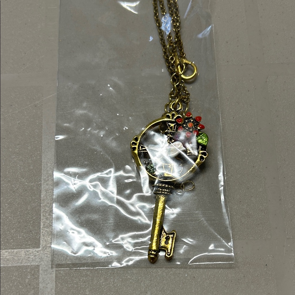 Chic Gold Key Necklace with Red and Green Details